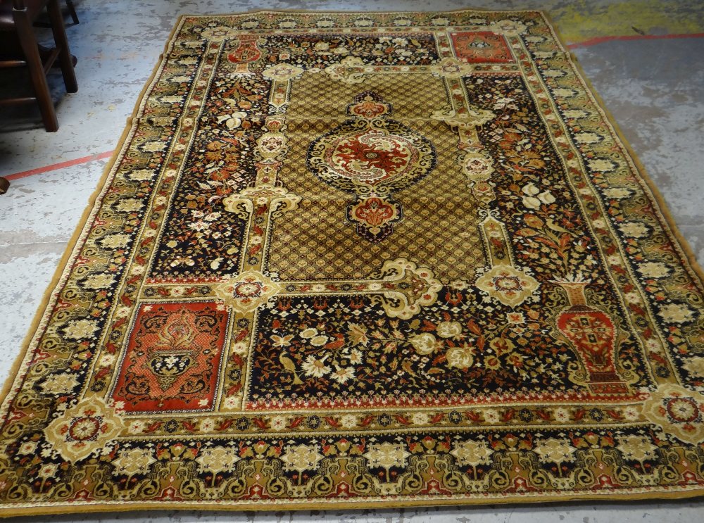 MAINLY GOLD & BLACK GROUND PERSIAN STYLE RUG with centre decoration and urn and flower decorated