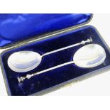CASED PAIR OF SILVER ANOINTING SPOONS with seal-type terminals, London 1905, William Hutton &