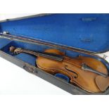 CASED VIOLIN & BOW labelled as a Stradivarius