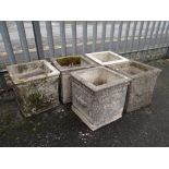 FIVE RECONSTITUTED SANDSTONE SQUARE BASED GARDEN PLANTERS