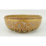 DOULTON CIRCULAR PEDESTAL BOWL decorated with scroll and geometric patters, possibly by Eliza