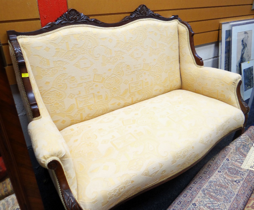 CARVED FRAME ANTIQUE TWO SEATER SETTEE, yellow arabesque upholstery, 116cms wide