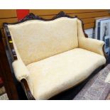 CARVED FRAME ANTIQUE TWO SEATER SETTEE, yellow arabesque upholstery, 116cms wide