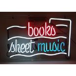 MID-CENTURY NEON ELECTRIC RETAILER'S SIGN with perspex cover 'Sheet Music / Books', 77 x 51cms