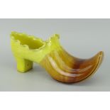 LINTHORPE MOTTLED GLAZE POTTERY MODEL OF A SHOE (yellow and brown glaze), 20cms long
