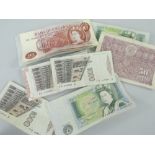 GB AND FOREIGN BANKNOTES to include £1 notes and ten shilling notes along with Malaya fifty cent
