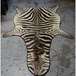 VINTAGE ZEBRA SKIN RUG, approximately 245 x 161cms