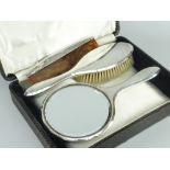 CASED THREE PIECE PART-SILVER VANITY CASE of plain form, Birmingham 1924