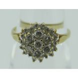 18CT YELLOW GOLD DIAMOND CLUSTER RING with centre brilliant-cut diamond approx, six surrounding