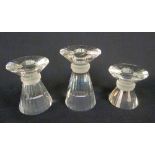 FOUR SWAROVSKI CRYSTAL 'NEO-CLASSIC' CANDLEHOLDERS small, medium and large