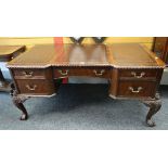 REPRODUCTION BREAK-FRONT DESK on ornate carved ball and claw supports and with bank of five drawers,