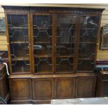 REPRODUCTION BREAK-FRONT BOOKCASE CUPBOARD with carved frieze, 201cms wide