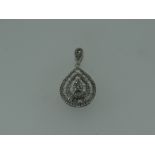 DIAMOND ENCRUSTED PEAR SHAPED PENDANT in box, with gem certificate