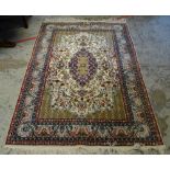 GOOD FINE WOOL PERSIAN RUG with bird and flower centre decoration and red and blue ground border,