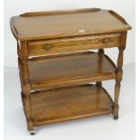 ERCOL THREE TIER TEA TROLLEY on casters, cutlery drawer and gallery top, 78cms wide