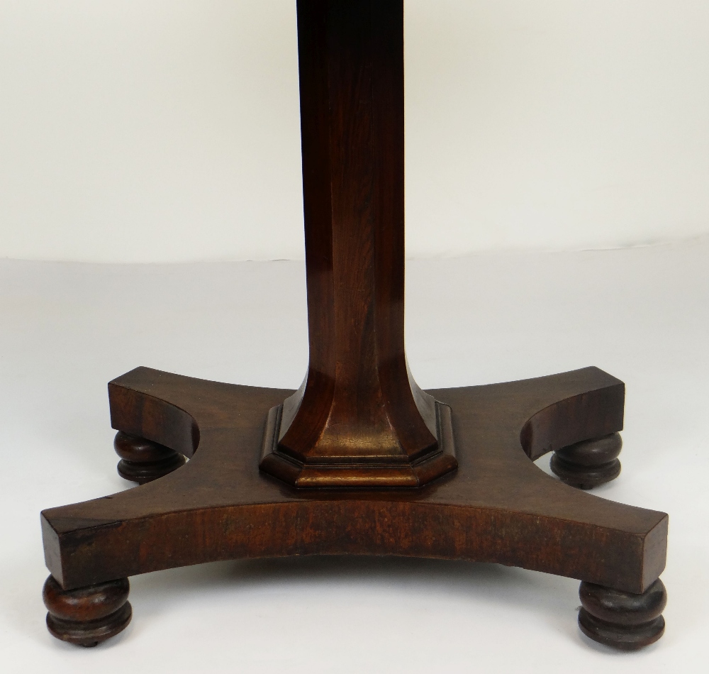 ANTIQUE ROSEWOOD FOLD-OVER CARD TABLE, faceted support on a shaped base with four bun feet, the - Image 2 of 3