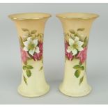 PAIR OF ROYAL WORCESTER BLUSH IVORY TRUMPET VASES decorated with roses and flowers, circa 1930's,