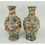 PAIR OF DOULTON LAMBETH GEORGE TINWORTH BALUSTER VASES overall decorated with applied bead and shell