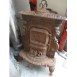 ORNATE ANTIQUE CAST IRON STOVE