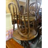 CIRCULAR BISTRO-TYPE TABLE with four vintage bistro-type bent-wood chairs