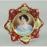 AUSTRIAN PORCELAIN DISH centred with a head and shoulders portrait of a female, signed 'Vettori'