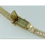 VINTAGE YELLOW GOLD 'KINGSTON' LADIES WRISTWATCH marked 14k, with flip case cover, 40.9gms