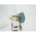 14K YELLOW GOLD BLUE TOPAZ RING 13.3gms