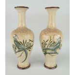 PAIR OF DOULTON LAMBETH BALUSTER VASES decorated with exotic birds, printed and inside marks to