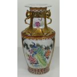 CHINESE STYLE FLOOR-STANDING BALUSTER VASE gilded with twin stork handles and floral panels, 93cms