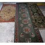 LARGE MAINLY RED & BLUE GROUND PERSIAN STYLE WOOLEN RUG with centre medallion and border, 370 x