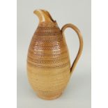 DOULTON LAMBETH EARTHENWARE LOOP HANDLED JUG of geometric banded design, impressed mark to base