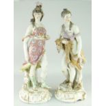 PAIR OF LARGE CONTINENTAL PORCELAIN FEMALE FIGURES in classical Roman dress, one with lion-skin, the