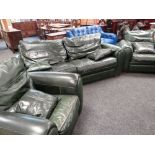 GOOD GREEN LEATHER THREE PIECE SUITE of large proportions and with four matching loose cushions