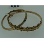 TWO 9CT YELLOW GOLD SCROLL ENGRAVED BANGLES, 12.4gms overall approximately (2)