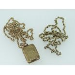 9CT YELLOW GOLD CHAIN TOGETHER WITH 9CT YELLOW GOLD LOCKET on yellow metal chain, 15.7gms overall.