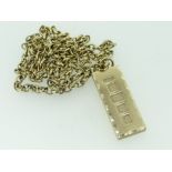 9CT YELLOW GOLD INGOT PENDANT ON 9CT YELLOW GOLD OVAL LINK CHAIN, 60.7gms overall , the chain