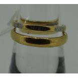 TWO 22CT YELLOW GOLD WEDDING BANDS, one having white metal flower head pattern, 5.8gms.