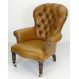 BUTTONED & STUDDED TAN LEATHER SPOON BACK ARMCHAIR