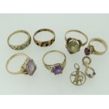 ASSORTED 9CT YELLOW GOLD JEWELLERY to include six stone set rings, pendant of archer design and ruby