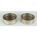 PAIR OF ELIZABETH II SILVER & WOOD WINE-COASTERS with beaded rims, London 1972, 13cms diam