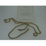 9CT YELLOW GOLD 'RIBBONS OF DIAMONDS', necklace and another similar in box, 16.8gms overall