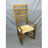 LANCASHIRE ELM ROCKING CHAIR, rush seated, 110cms height, 53cms width, 39cms seat depth (worm