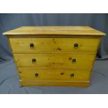 STRIPPED PINE CHEST OF THREE LONG DRAWERS with ring pull handles, 81cms height, 108cms width, 46.