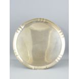 CIRCULAR TRAY of plain form with shaped rim, uninscribed, London 1936, 29cms diameter, 29.5ozs