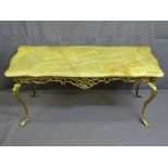 ONYX TOP GILT BRASS RECTANGULAR COFFEE TABLE with mask corners on shaped supports, 49cms height,