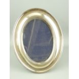 MAPPIN & WEBB PHOTO FRAME - unmarked but possibly silver, oval for a photo, 13 x 9cms