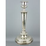 GEORGIAN SILVER CANDLE HOLDER with stepped circular decorative base with one line inscription and