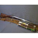 ANTIQUE DOUBLE BARREL MUSKET RIFLE, fishing rods, other fishing equipment and a boxed gun cleaning