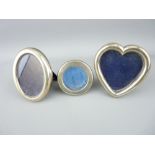 SILVER MINIATURE PHOTO FRAMES - one circular, one oval and one heart shaped, all marked 925