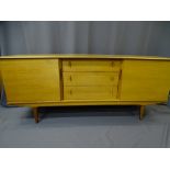 STYLISH MID-CENTURY LONG SIDEBOARD having three central drawers with flanking cupboard doors,